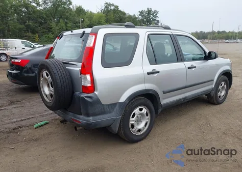 2006 Honda Cr-V Lx z USA, uszkodzony, nr VIN SHSRD78526U409026
